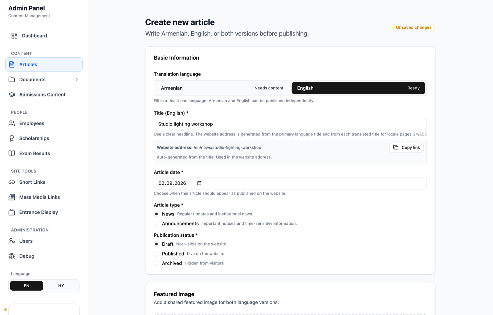 Create article form in English with dummy title Studio lighting workshop, draft status selected